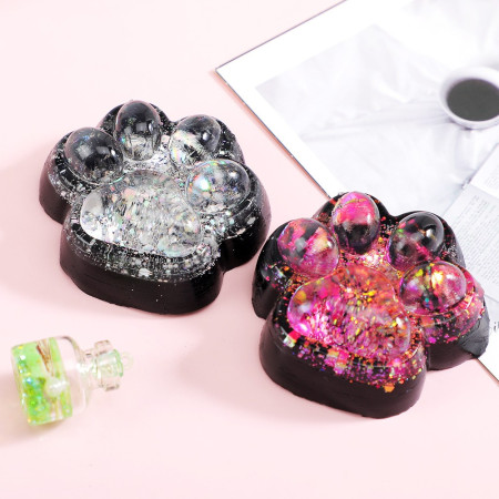 Jucarie Antistres Squishy, Cyrax, cu Revenire Lenta, Squeeze Pinch Family, Model Labuta de Pisica cu Sclipici, 6.5x6 cm, 60g, Ambalaj Transparent, Roz-Negru