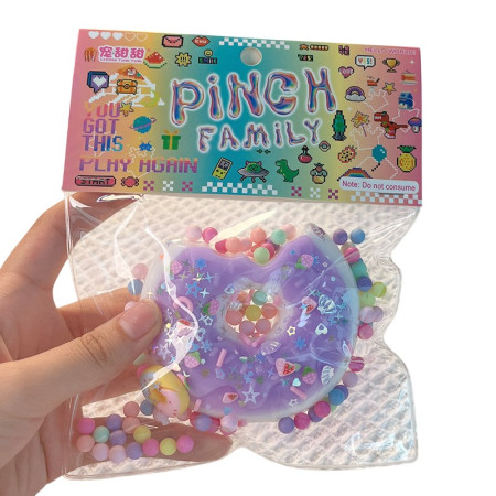 Jucarie Antistres Squishy, Cyrax, cu Revenire Lenta, Squeeze Pinch Family, Model Gogoasa, 6x6 cm, 99g, Ambalaj Transparent, Mov