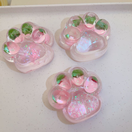 Jucarie Antistres Squishy, Cyrax, cu Revenire Lenta, Squeeze Pinch Family, Model Labuta de Pisica cu Sclipici, 6.5x6 cm, 60g, Ambalaj Transparent, Roz